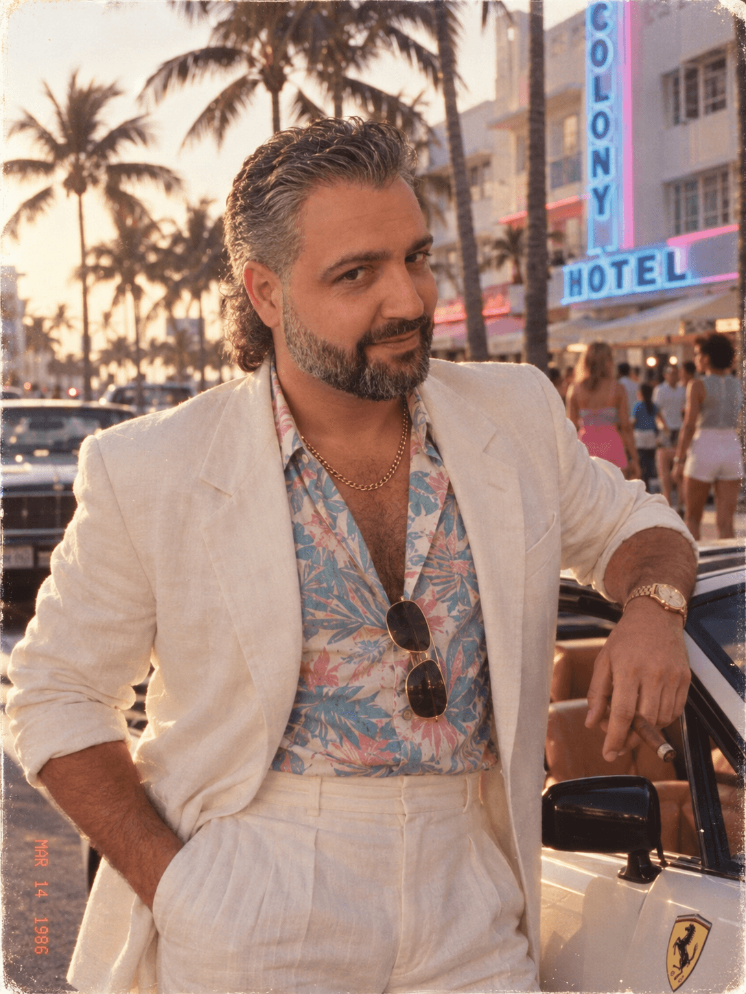 Nir Ashkenazi standing beside a car in Miami